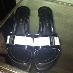 Black and white Bebe wedge sandals