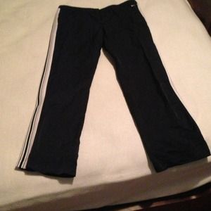 Bundle: Nike pants and xoxo wristlet for $15.