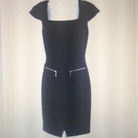 Oscar de la Renta sheath career dress.