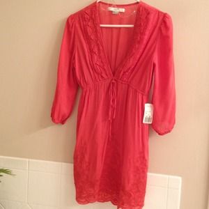 Brand new with tag dress or swim cover up.
