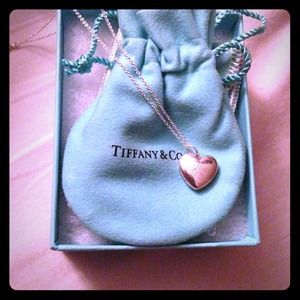Tiffany "I love you" Locket and chain .