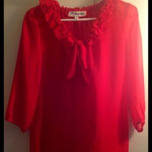 Red ruffle "V" neck blouse