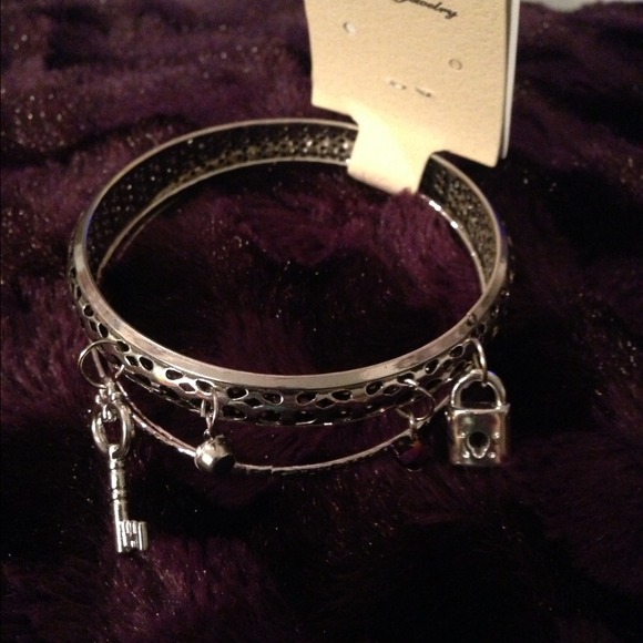 Lock and key silver bangles