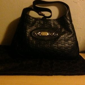 **Practically New** AUTHENTIC Gucci Handbag.