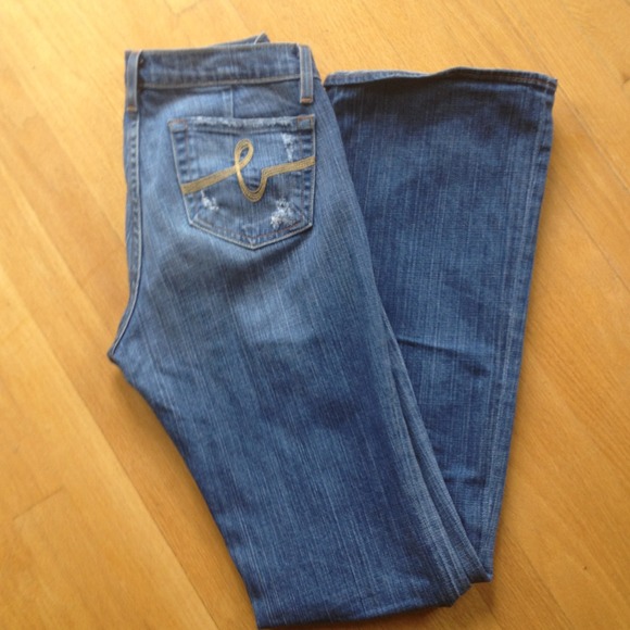 BEBE jeans size 29 slight destruction in areas