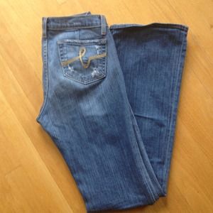 BEBE jeans size 29 slight destruction in areas