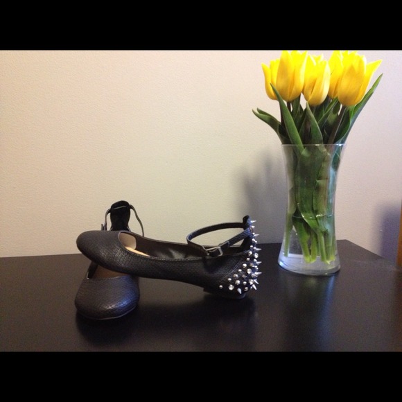Brand new never worn adorable black spike flats