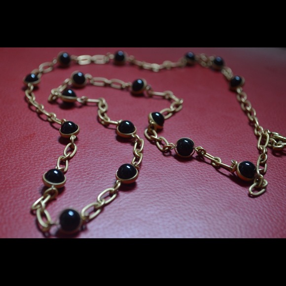 Black bead and gold chain necklace