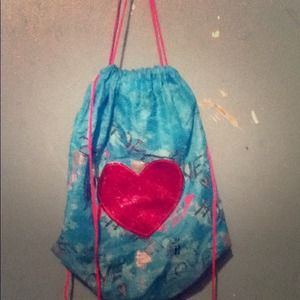 Blue with pink heart bag.