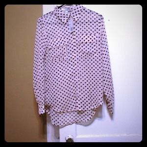 Long sleeved pink/black polka dotted chiffon top.