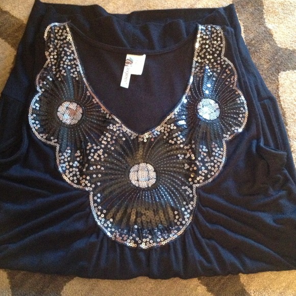 Long, sleeveless top!