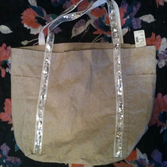 Light brown canvas tote with silver sequin handles