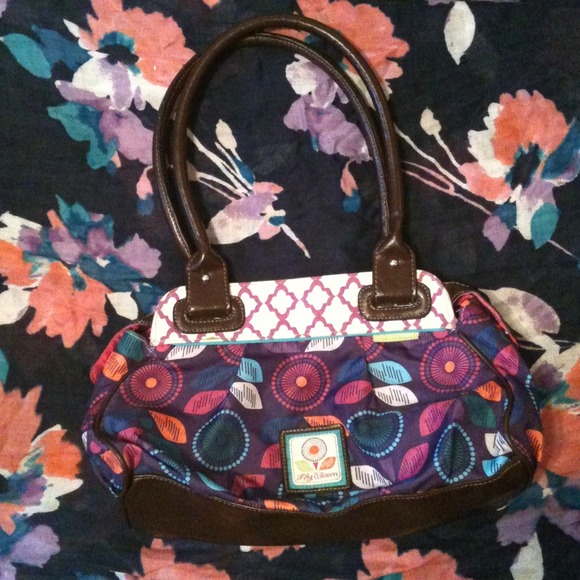 Purple Lily Bloom purse with multicolored pattern