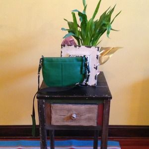 Authentic Coach dark green leather cross body bag.