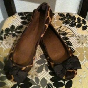 Giraffe print flats with bow detail