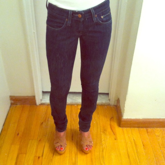 Levi's "too superlow" #524 denim in dark blue.