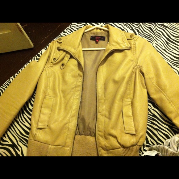 Leather beige jacket.