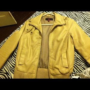 Leather beige jacket.