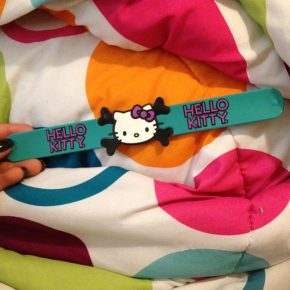 Accessories - Hello kitty torquise silicone snap bracelet .