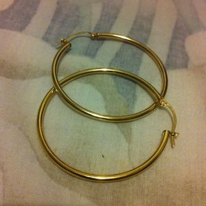14k yellow gold hoops.
