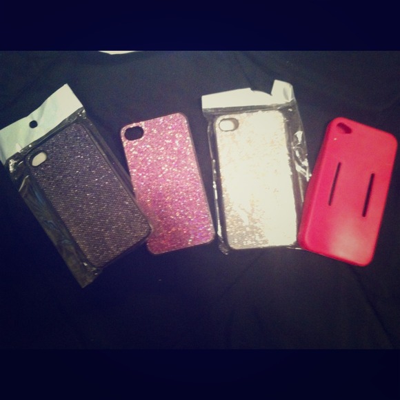 Silver, black, pink, and gummy pink iPhone 4 cases