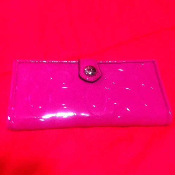 Coach embossed magenta wallet