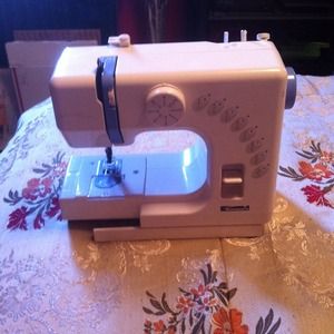 On hold * Kenmore sawing machine ..