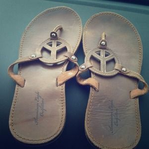 Peace sign flip flops