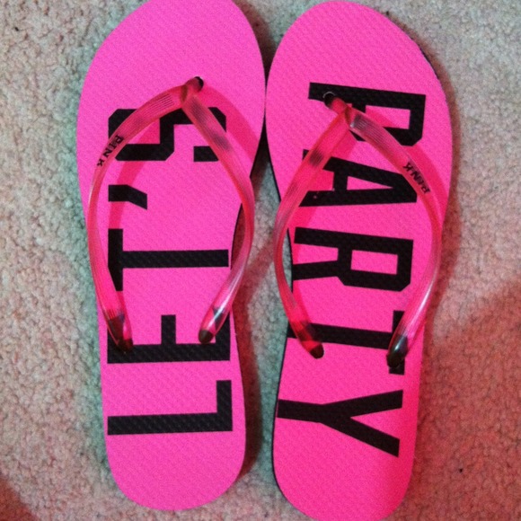 PINK flip flops.