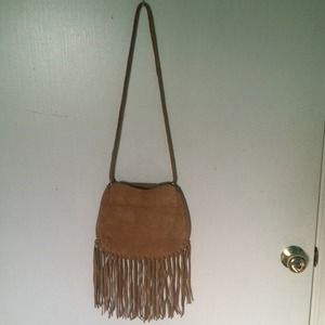 Fringed leather across The body bag