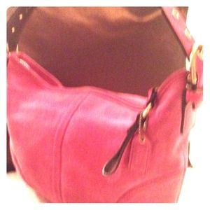Fuschia suede leather Coach Soho purse.