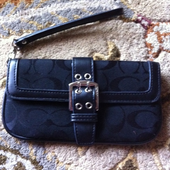 Hold. Black coach wristlet/ clutch