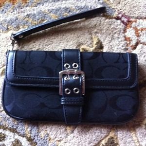 Hold. Black coach wristlet/ clutch
