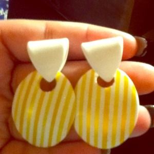 White earrings with yellow stripes