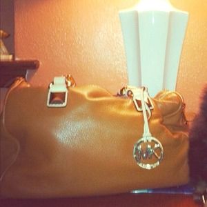 Caramel colored Michael Kors bag. Gently used.