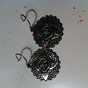 Silver dangly earrings with blue detail