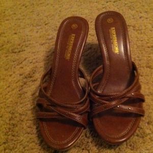 Brown expressions foot wear for woman.