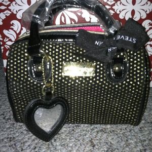 Steve Madden purse and purple skinniest