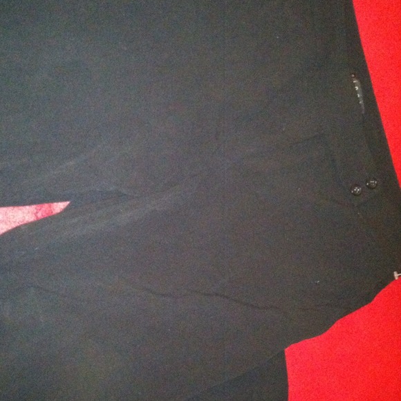 Size 12 black dress pant wide cuff on hem.