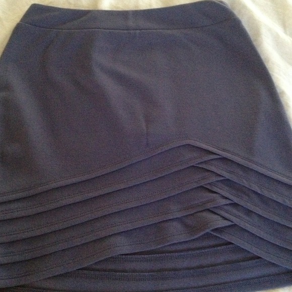 Mid thigh skirt.