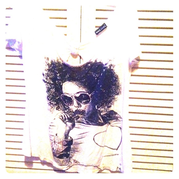 A barely crop top, with cutouts in the back - Picture 1 of 3