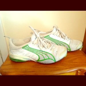Green & white puma running shoes.