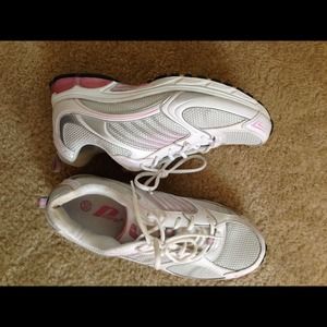 Pink and white running shoes