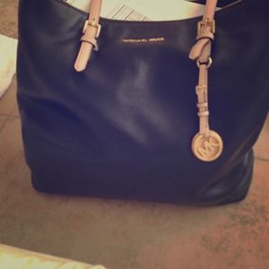 Black leather huge Michael Koran bag branch new