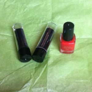 One nail polish and two lipsticks.