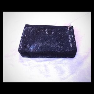 Black sequined makeup bag