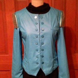 Blue leather like jkt. Knit cap zipped into sleeve