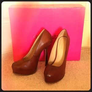 On hold for Melody! Brown Pumps