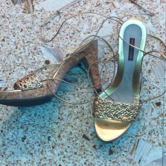 Nice gold three in cork heel