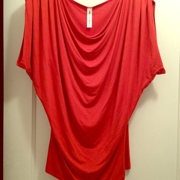 Orange draped top